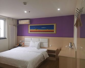 7Days Inn Yinchuan Xita - ينتشوان - غرفة نوم