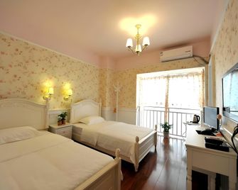 Zhangjiajie Nine Hotel - Zhangjiajie - Habitación