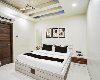 Hotel Arjun International - Лакнау - Спальня