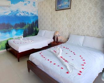 Hai Yen Family Hotel - Phan Thiet - Schlafzimmer