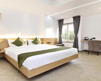 Treebo City Inn, Satara - Sātāra - Bedroom