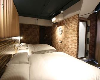 R10 Eco Hotel - Cao Hùng - Phòng ngủ