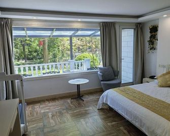 Binjiang Resort Center - Shanghai - Chambre
