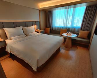 Ji Hotel Xianggang Middle Road Qingdao - تشينغداو - غرفة نوم