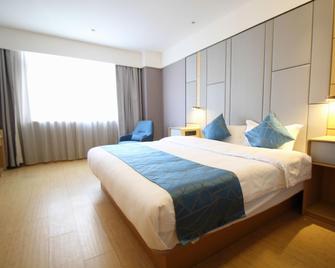 Shanghai Huaihai Hotel - Şanghay - Yatak Odası