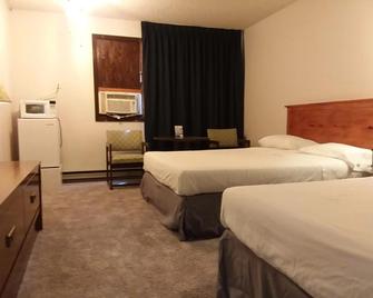 Americas Best Value Inn Laramie - Laramie - Bedroom