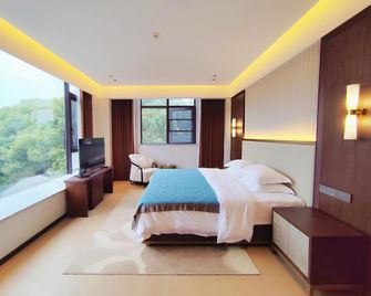 Ma'anshan Nanhu Hotel - Ma'anshan - Bedroom