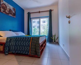 Dive into a peaceful serene part of yourself - Fumba - Sypialnia