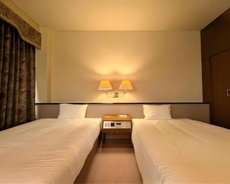 Hotel Sakushu Musashi - Mimasaka - Спальня