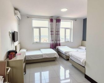 Tianjin Orange Apartment - Tianjín - Habitación