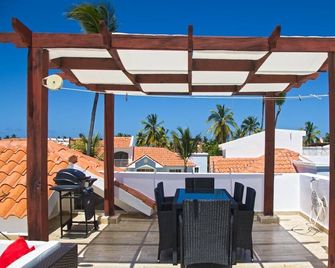 Penthouse With Private Roof Top Oasis . Short Walk to The Beach - Punta Cana - Balcony