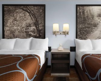 Super 8 by Wyndham Covington - Covington - Schlafzimmer