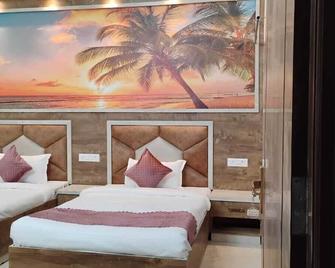 Devvanshi Palace - ורנאסי - חדר שינה