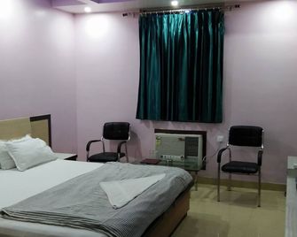 M S Hotel - Bhāgalpur - Bedroom