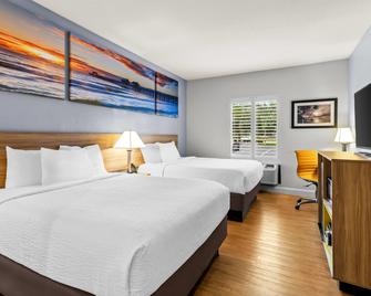 Days Inn & Suites by Wyndham Lakeland - לייקלנד - חדר שינה