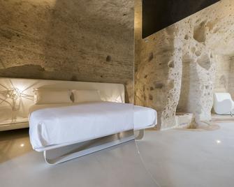 Aquatio Cave Luxury Hotel & Spa - Matera - Slaapkamer