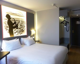 Hotel Inn Design Paris Saint Quentin - Montigny-le-Bretonneux - Slaapkamer