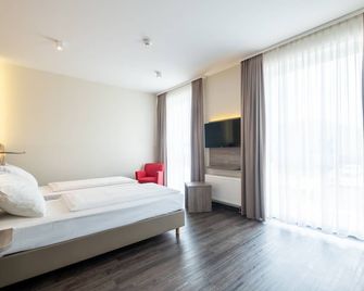 Amaro Hotel - Bergkirchen - Bedroom