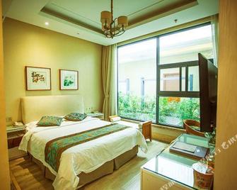 Haoli Holiday Hotel (Guangde Municipal Government) - Xuancheng - Bedroom