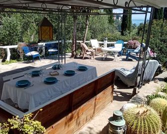 Cottage surrounded by nature a stone's throw from the sea - Monte Argentario - Patio