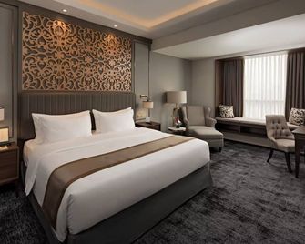 Sutasoma Hotel - Jakarta - Bedroom