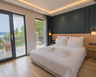 Cunda Pier Otel - אייבאליק - חדר שינה