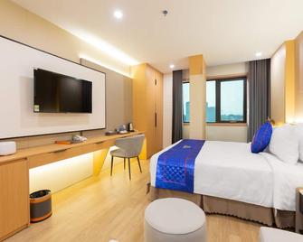 Sunshine Apartment Hotel - Mong Cai - Camera da letto