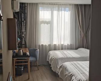 Home Inn Urumuqi Medical College - Ürümqi - Habitación