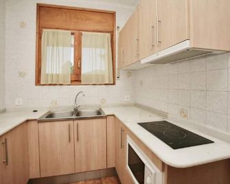 Rentalmar El Pinar Adosados - Miami Platja - Kitchen