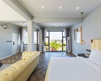 Mubai Light Luxury Hostel - Dali - Bedroom