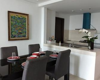 Charming Minimalist 3 Bedroom Apartment in St Moritz Puri Indah - Jakarta - Matsal