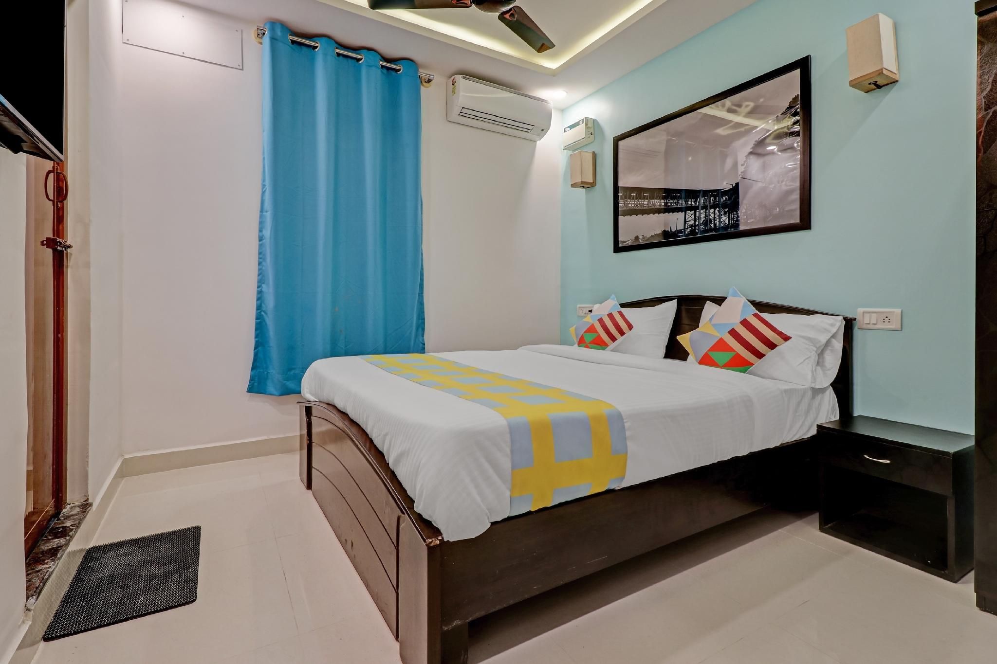 OYO Home 81332 Shiva Shakthi Inn - באנגאלור - חדר שינה