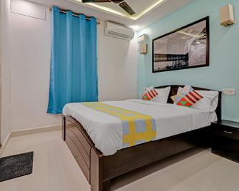 OYO Home 81332 Shiva Shakthi Inn - Bangalore - Habitación