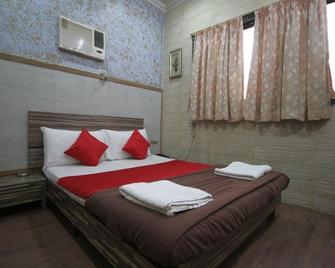 Hotel New India - Mumbai - Schlafzimmer