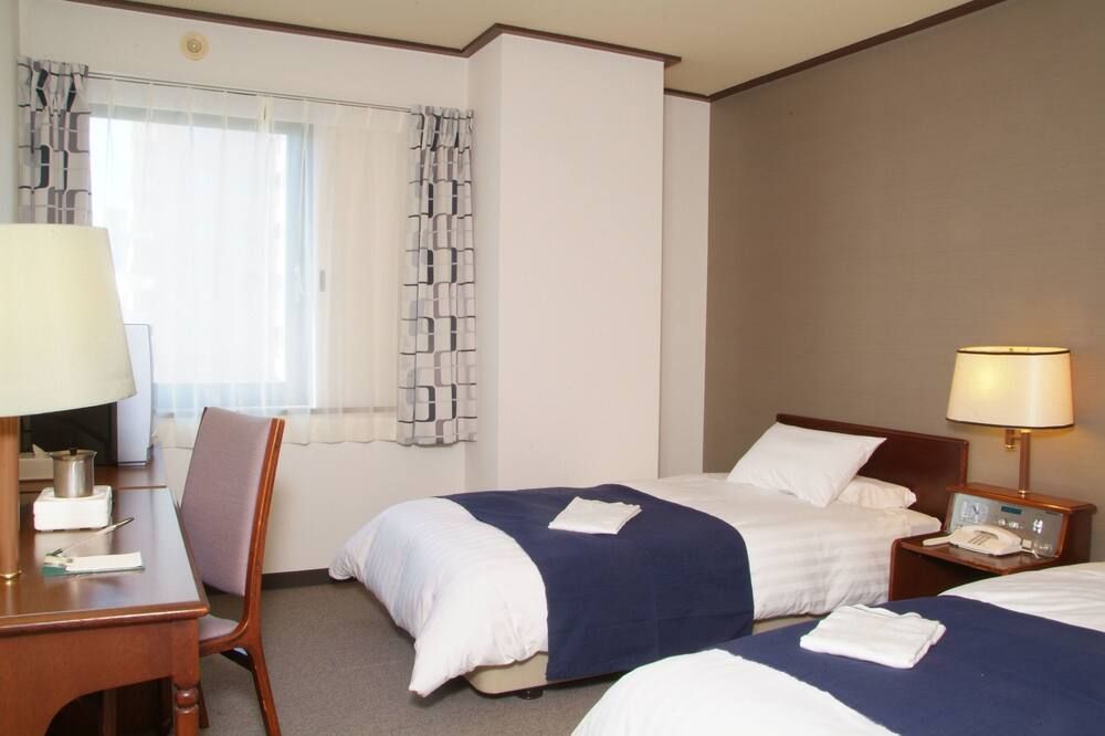 Hotel Tomakomai Green Hills - Tomakomai - Bedroom