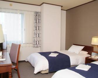 Hotel Tomakomai Green Hills - Tomakomai - Bedroom