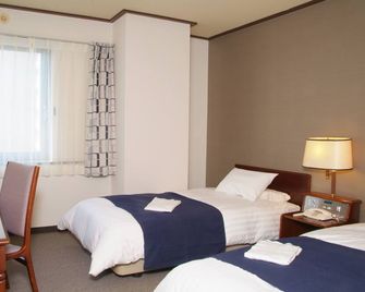 Hotel Tomakomai Green Hills - Tomakomai - Bedroom