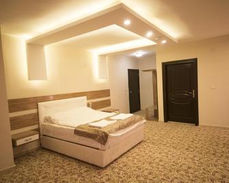 Osmaniye Hanedan Otel - Osmaniye - Bedroom