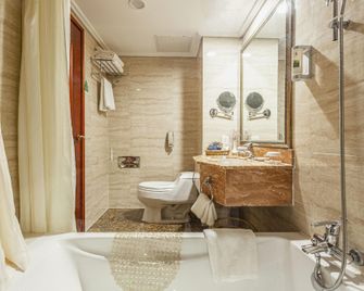 Qingdao Huiquan Dynasty Hotel - Qingdao - Bedroom