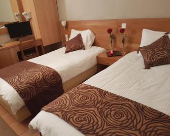 Glaros Hotel - Pire - Yatak Odası