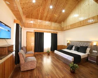 Tirthan Villa And Resort - Gushaini - Bedroom
