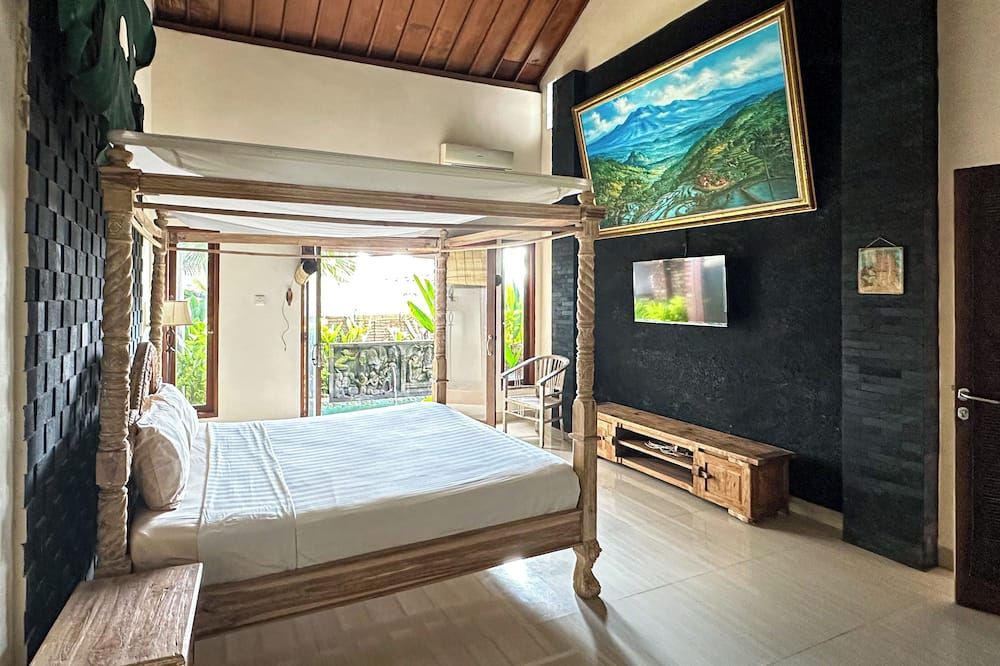 Dayin Villa - South Kuta - חדר שינה