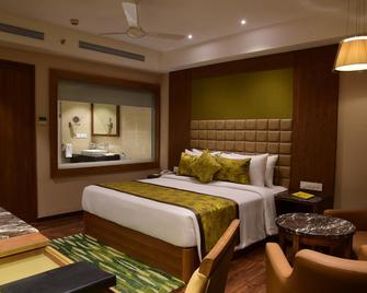 Lemon Tree Hotel Siliguri - Siliguri - Bedroom