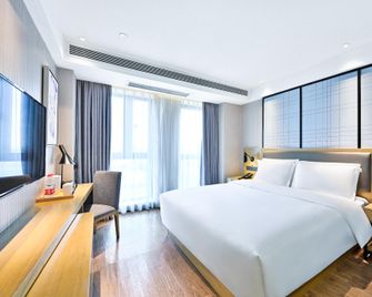 Echarm Hotel Chongqing West Railway Station - Chongqing - Schlafzimmer