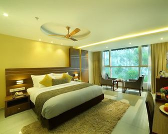 Blanket Hotel and Spa - Munnar - Slaapkamer