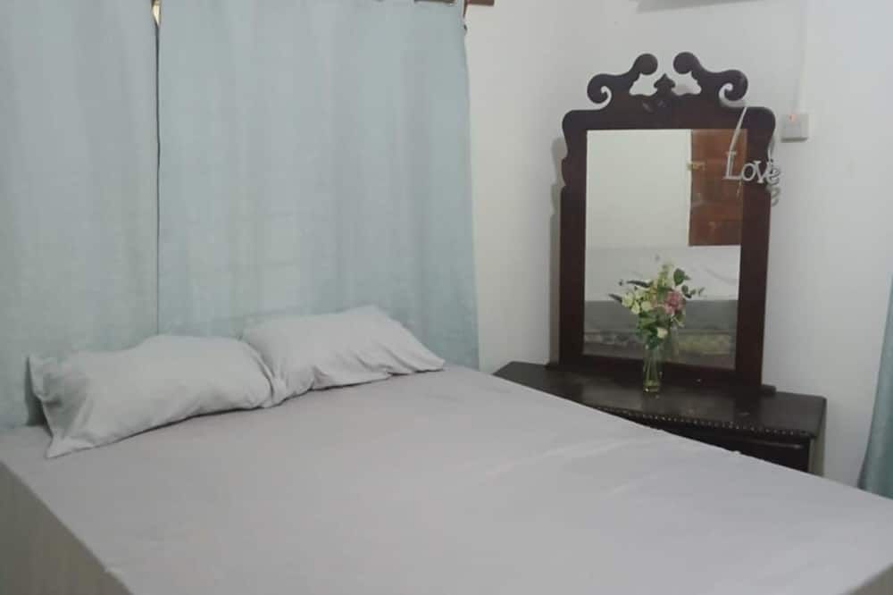 إنز روتس هوستل - مونتيغو باي - غرفة نوم