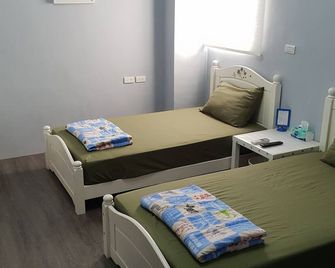 Single-Family Villa [Room202] Sleeps 2, Extra Bed, Wet Dry Seperated Bathroom - Magong - Schlafzimmer