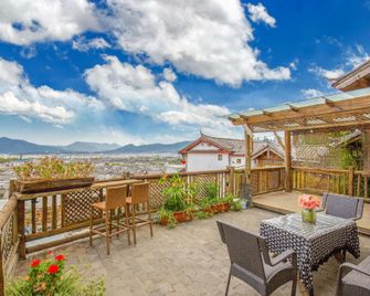 Lijiang Banshan Huayu Inn - ליז'יאנג - מרפסת