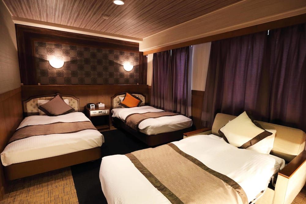 هوتل آيريا ون كوتشي - كوشي - غرفة نوم