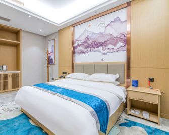 Hengrui Hotel (Yan'an Railway Station Nanniwan Airport) - Yan’an - Bedroom